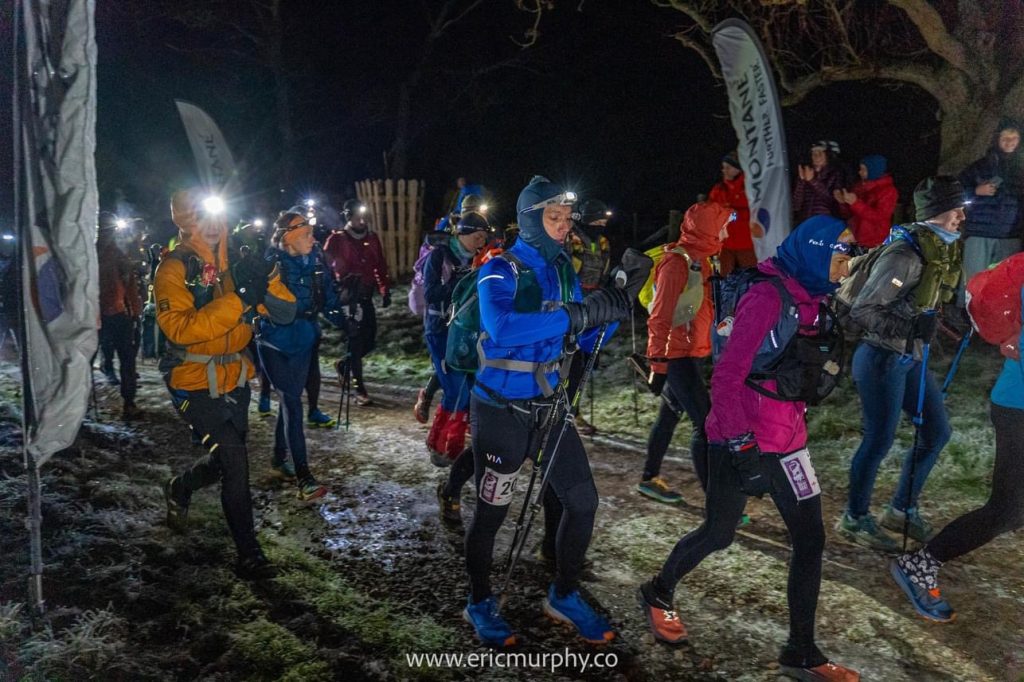 Running the UK’s loneliest Ultra - The Montane Cheviot Goat - image of a group of runners starting a race in the dark
