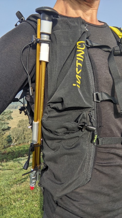 Close up of the Instinct XX20-24 Trail Running Vest showing a tent pole fastened to the front of the vest.